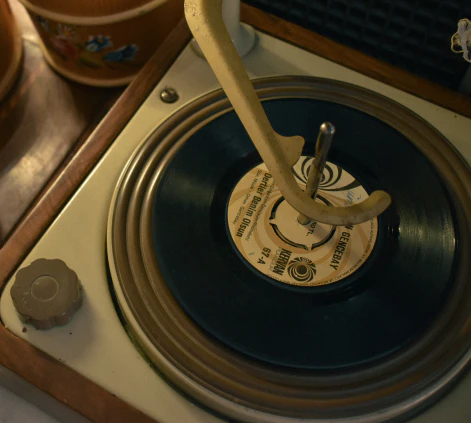 vintage vinyl record playing in a turntable